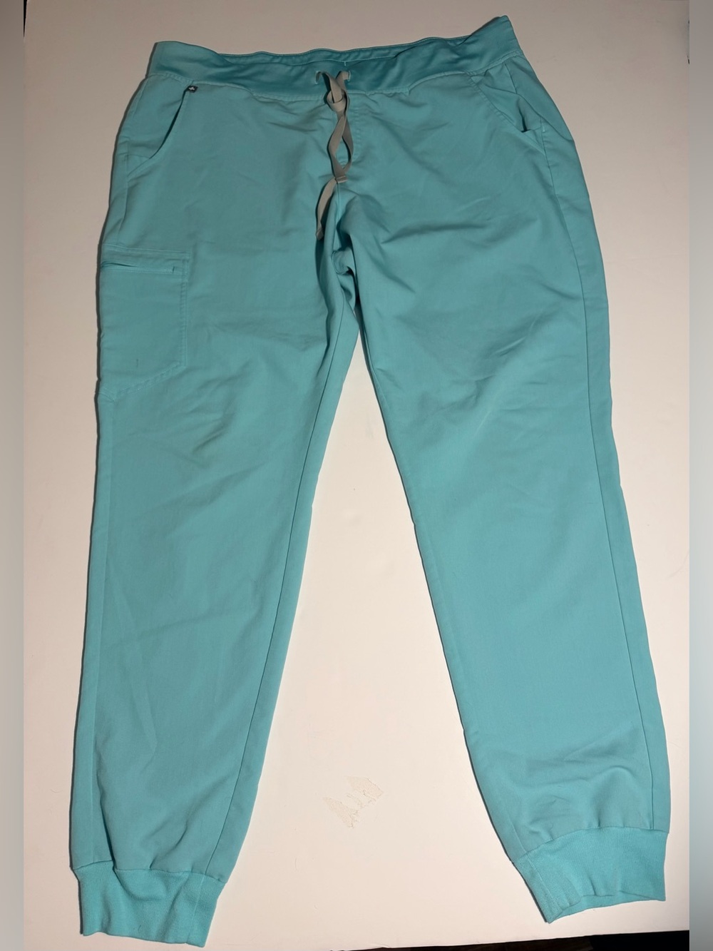 Figs Women Scrub Teal Set with Jogger bottoms .